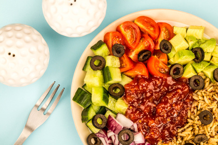 Healthy Vegetarian Or Vegan Mediterranean Salad Against A Blue Backgroundの写真素材