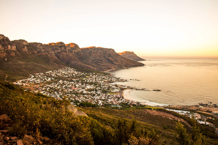 Camps Bay Cape Town South Africa At Sunrise Showeing The Waterfront and Mountains Behindの写真素材