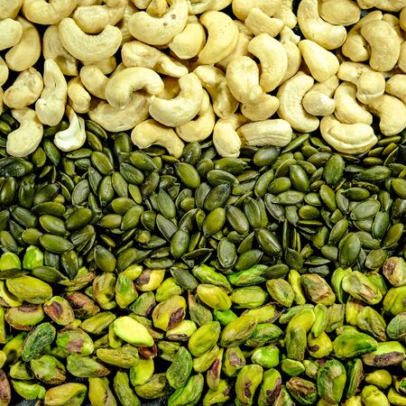 Close Up Pistachio Nuts, Pumpkin Seeds and Cashew Nuts In a Patternpile, heap, stack,の写真素材