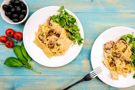 Italian Style Vegetarian Mushroom Pappardelle Pasta Meal With a Fresh Summer Green Salad