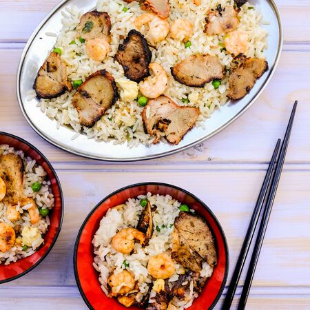 Chinese Style Egg Fried Rice With Pork and King or Tiger Prawnsの写真素材