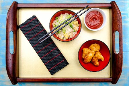 Chinese Style Sweet and Sour Fried Chicken With Egg Fried Rice and Vegetables