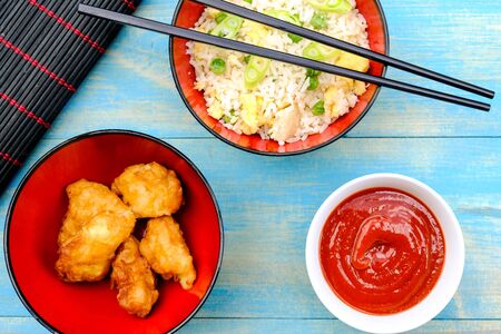 Chinese Style Sweet and Sour Fried Chicken With Egg Fried Rice and Vegetables