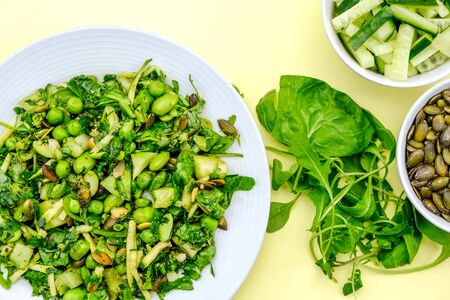 Healthy Fresh Green Summer Salad With Edamame Beans, Cucumber, Sunflower Seeds and Green Leaves