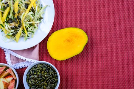 Fresh Healthy Summer Mango Fruit Salad With Apple Cabbage and Ginger Dressingの写真素材