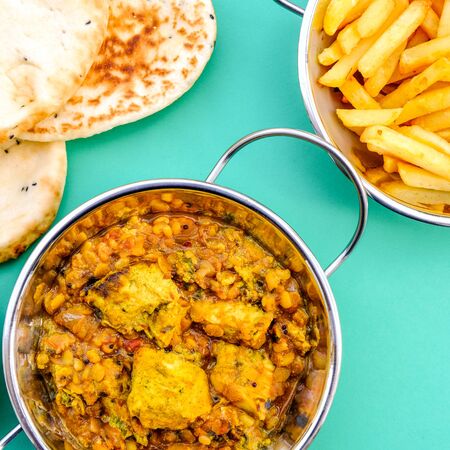 Indian Style Traditional Chicken Dhansak Curry With Chips or fries