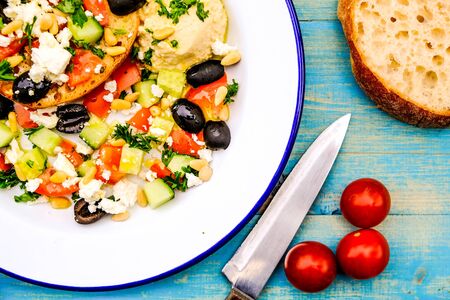 Healthy Mediterranean Style Breakfast With Ciabatta Bread, Black Olives, Feta Cheese and Tomatoesの写真素材