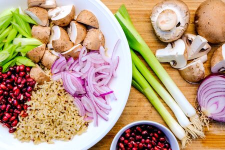 Vegetarian Mushroom and Rice Poke Bowl, With Chestnut Mushrooms, Pomegranate Seeds, Spring Oniond and Red Onionsの写真素材