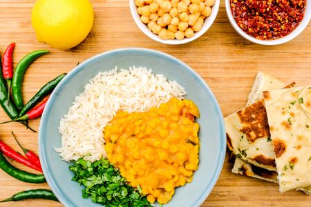 Indian Style Healthy Vegetarian Lentil Curry With Basmati Rice, Chickpeas and Coriander Herbsの写真素材