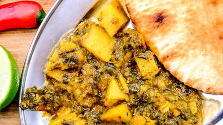 Traditional Authentic Indian Vegetarian Curry With Coriander and Flat Bread