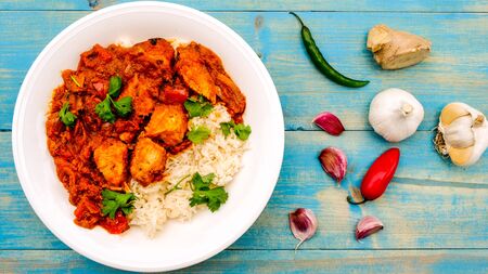 Indian Style Spicy Hot Chicken Jalfrezi Curry With Basmati Riceの写真素材