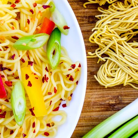 Egg Noodle and Red Chilli Salad, With Spring Onions, Red and Yellow Peppers and Chilli Flakes For Seasoningの写真素材
