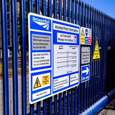 London, May 31, 2020, National Rail Fix New Health And Safety Warning Notices At Sutton Mail Line Station During COVID-19のeditorial素材