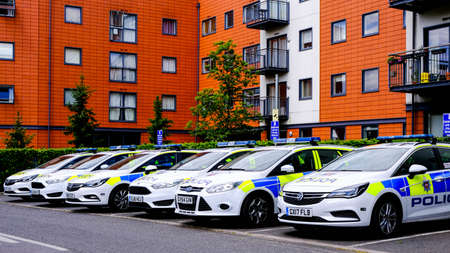 Line Of Law Enforcement Police Vehicles, Parked With No People