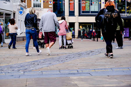 Groups Of People And Students Walking On High Street, COVID-19 Coronavirus Pandemicのeditorial素材