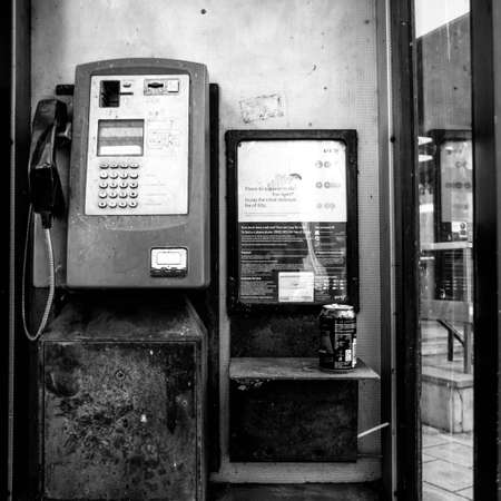 London UK October 06 2020, British Telecommunication Or BT Public Telephone Box With An Empty Can Of Drinkのeditorial素材
