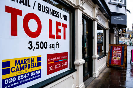 London UK, March 26 2021, Estate Agents To Let Sign Board In A Shop Window Following A Business...