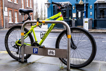 London UK, March 26 2021, A Colourful Bicycle Parked On The Side Of A Road With No People