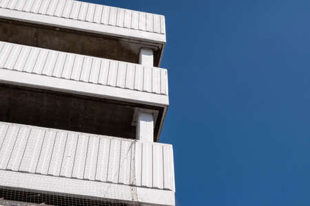 Kingston Upon Thames London UK, April 19 2021, High Rise Multi-Storey Car Park Painted White Against...