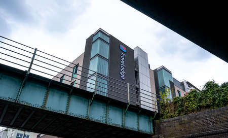Epsom Surrey London UK, May 02 2021, Railway Bridge Structure And Travelodge Hotel Looking Up With...