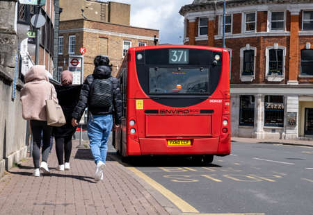 Kingston Upon Thames London UK, May 04 2021, Three Anonymous Woman Walking Along Pavementment Next...