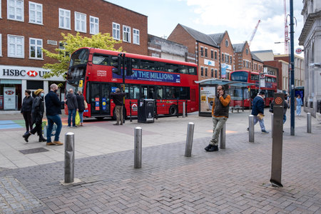 Kingston Upon Thames London UK, May 07 2021, Red Double Decker Public Transport Busses In A High Street With People Or Shoppersのeditorial素材