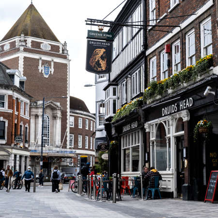 Kingston Upon Thames London UK, May 07 2021, Druids Head Pub And Kingston Town Hall With People And Shoppers In A Pedestrian Zoneのeditorial素材
