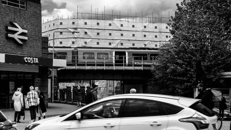 Kingston Upon Thames London, May 07 2021, Railway Train Crossing A Bridge Ourside Kingston Railway...