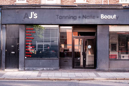 Epsom Surrey, London UK, May 22 2022, Closed Failed High Street Womens Nail and Tanning Shop Beauty Businessのeditorial素材