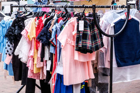 Epsom Surrey, London UK, May 28 2022, Fashion Clothing Hanging On A Rail In A Market Traders Stallのeditorial素材