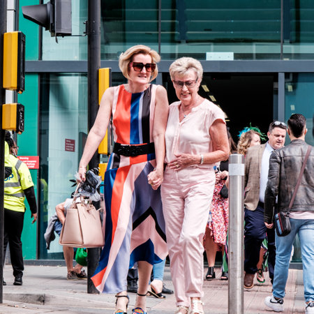 Epson Surrey, London UK, June 03 2022, Crowds Of Fashionable Dressed Racegoers Outside Epsom Railway Station For The Epsom Classic Derby Horse Raceのeditorial素材