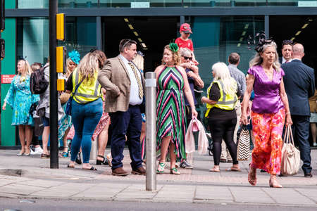 Epson Surrey, London UK, June 03 2022, Crowds Of Fashionable Dressed Racegoers Outside Epsom Railway Station For The Epsom Classic Derby Horse Raceのeditorial素材