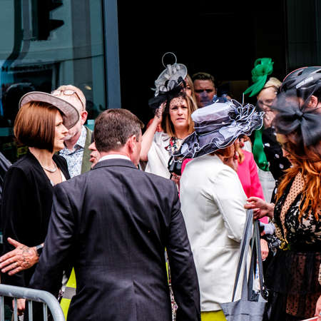 Epson Surrey, London UK, June 03 2022, Crowds Of Fashionable Dressed Racegoers Outside Epsom Railway Station For The Epsom Classic Derby Horse Raceのeditorial素材
