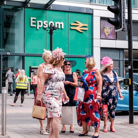 Epson Surrey, London UK, June 03 2022, Crowds Of Fashionable Dressed Racegoers Outside Epsom Railway Station For The Epsom Classic Derby Horse Raceのeditorial素材