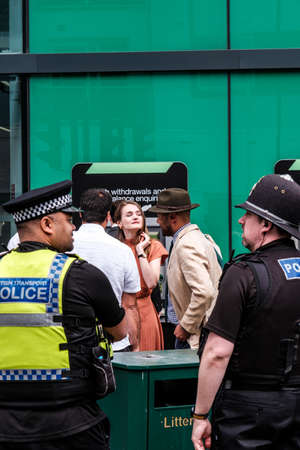Epson Surrey, London UK, June 03 2022, Police Officers And Genral Public Outside Epsom Railway...