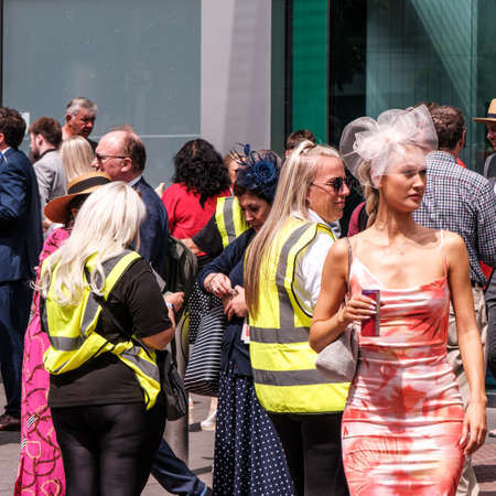 Epson Surrey, London UK, June 03 2022, Crowds Of Fashionable Dressed Racegoers Outside Epsom Railway Station For The Epsom Classic Derby Horse Raceのeditorial素材