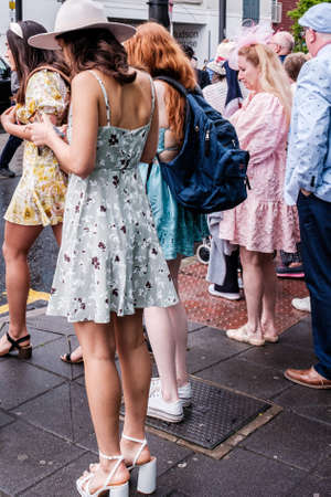 Epsom Surrey, London UK, June 04 2022, Small Group Of Women Wearing Short Summer Dresses Waiting To Cross A Roadのeditorial素材
