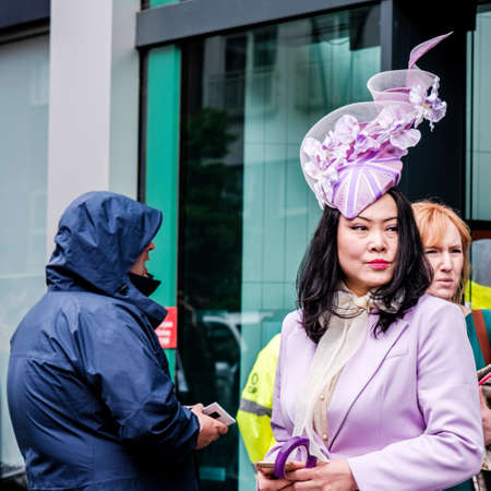 Epsom Surrey, London UK, June 04 2022, Attractive Asian Woman Wearing Lilac Jacket And Headwear...