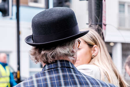 Epsom Surrey, London UK, June 04 2022, Man Wearing Traditional Black Bowler Hat And funky Bright Jacketのeditorial素材