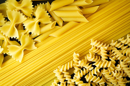 London UK, May 07 2025, Selection of Italian Dry Pasta Including Penne, Spaghetti, fusilli and...