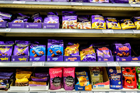London UK, January 02 2026, Selection Of Packets Of Cadbury Chocolate Sweets On A Supermarket Shelf