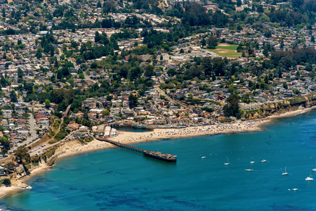 The aerial view of the beach with tourists in the city of Capitola in Northern California, close to the city of Santa Cruz.の写真素材