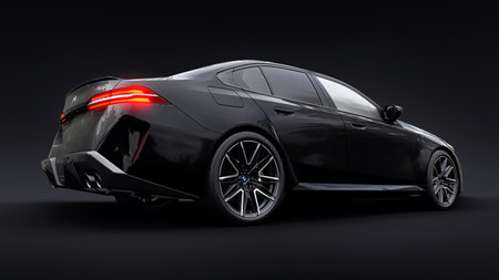 Germany, Berlin. November 04, 2024. BMW M5 G60 2024. Black sporty city sedan for family and exciting driving experience on a black background. 3d renderingの写真素材