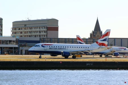 , UK - SEPTEMBER 11, 2016: An Embraer ERJ-170STD by British Airways CityFlyer (G-LCYG) during takeoff at London City Airport (LCY) 1/4のeditorial素材