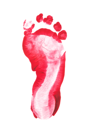 Kid foot prints red color isolated on white background. fingerprint or stamp texture artwork of kids for education and journey. Bottom view. Close up.の写真素材