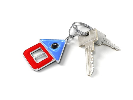 keys with charm in the form of a small houseの写真素材