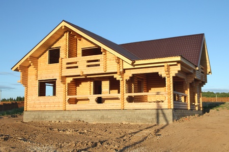 wooden house under constructionの写真素材