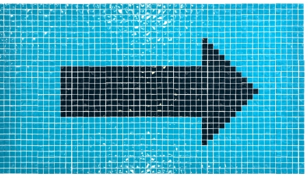 arrow sign made of glossy ceramic piecesの写真素材