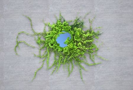 energy and power of creative nature enters through a hole in the wallの写真素材