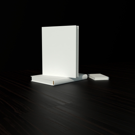 white blank book in hard cover on black backgroundの写真素材